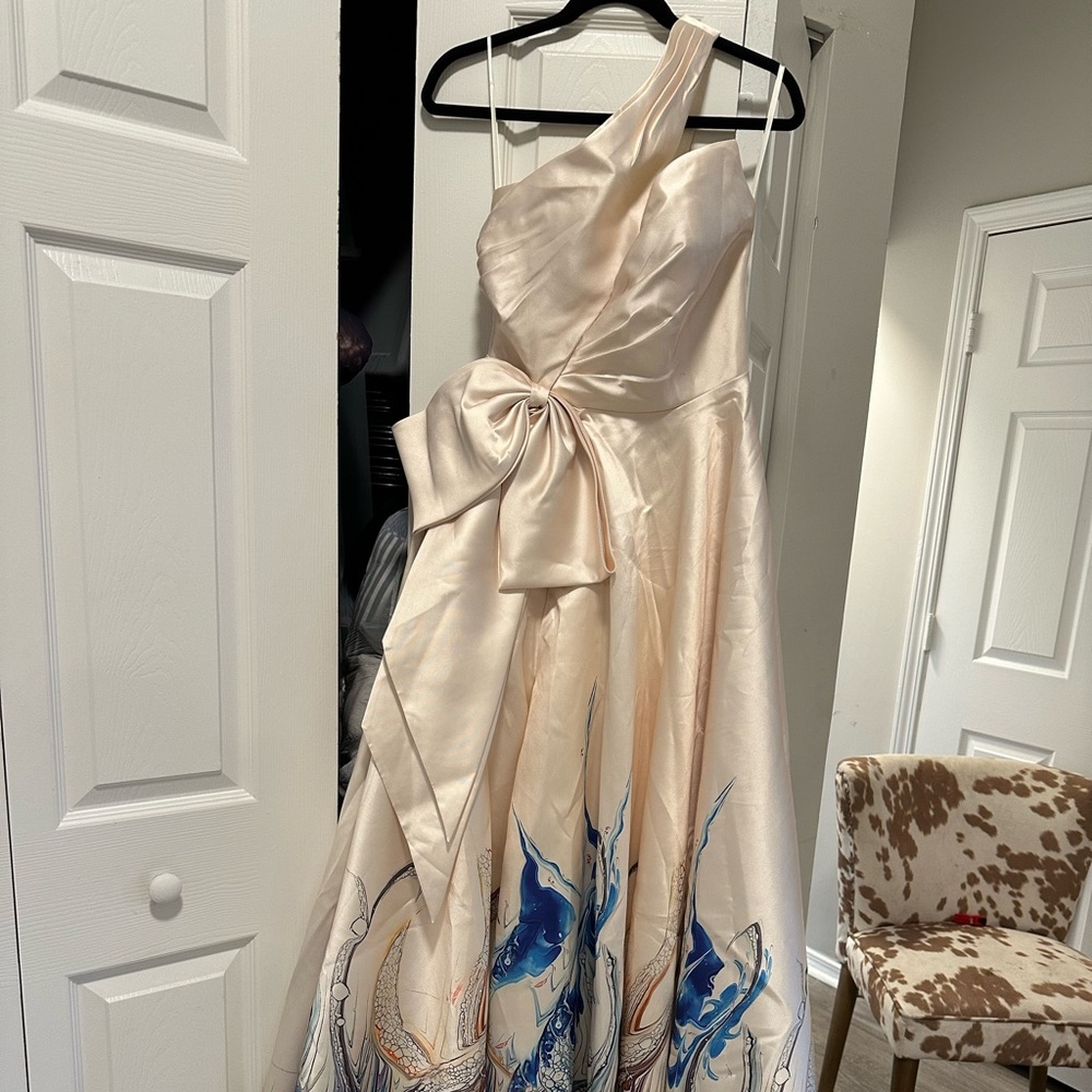 Prince One-Shoulder Dress in Cream with bottom flowing with blues & more